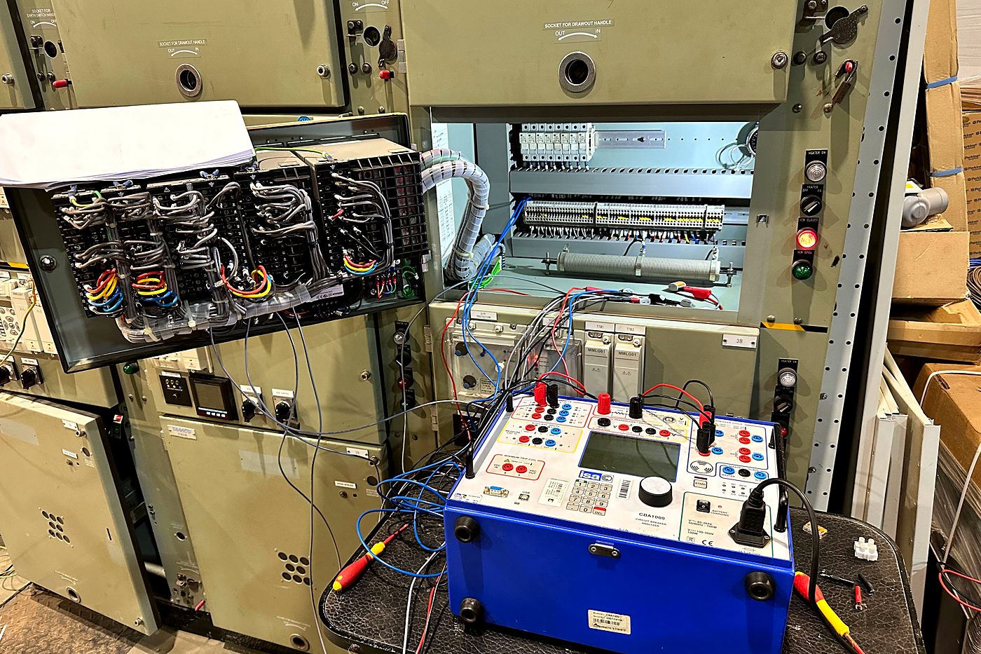 Secondary injection test set connected to a protection panel